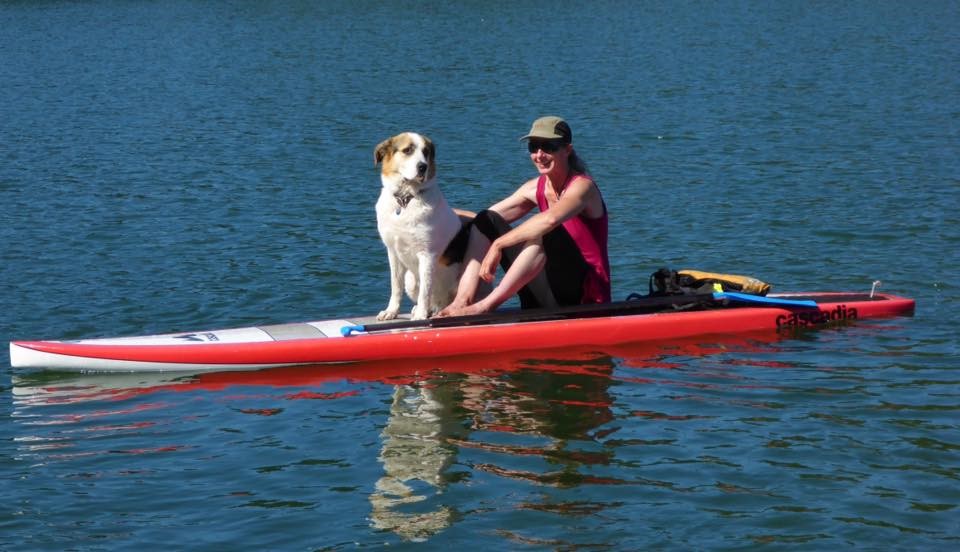 Claudia and her dog Yoda go everywhere together...even on a SUP